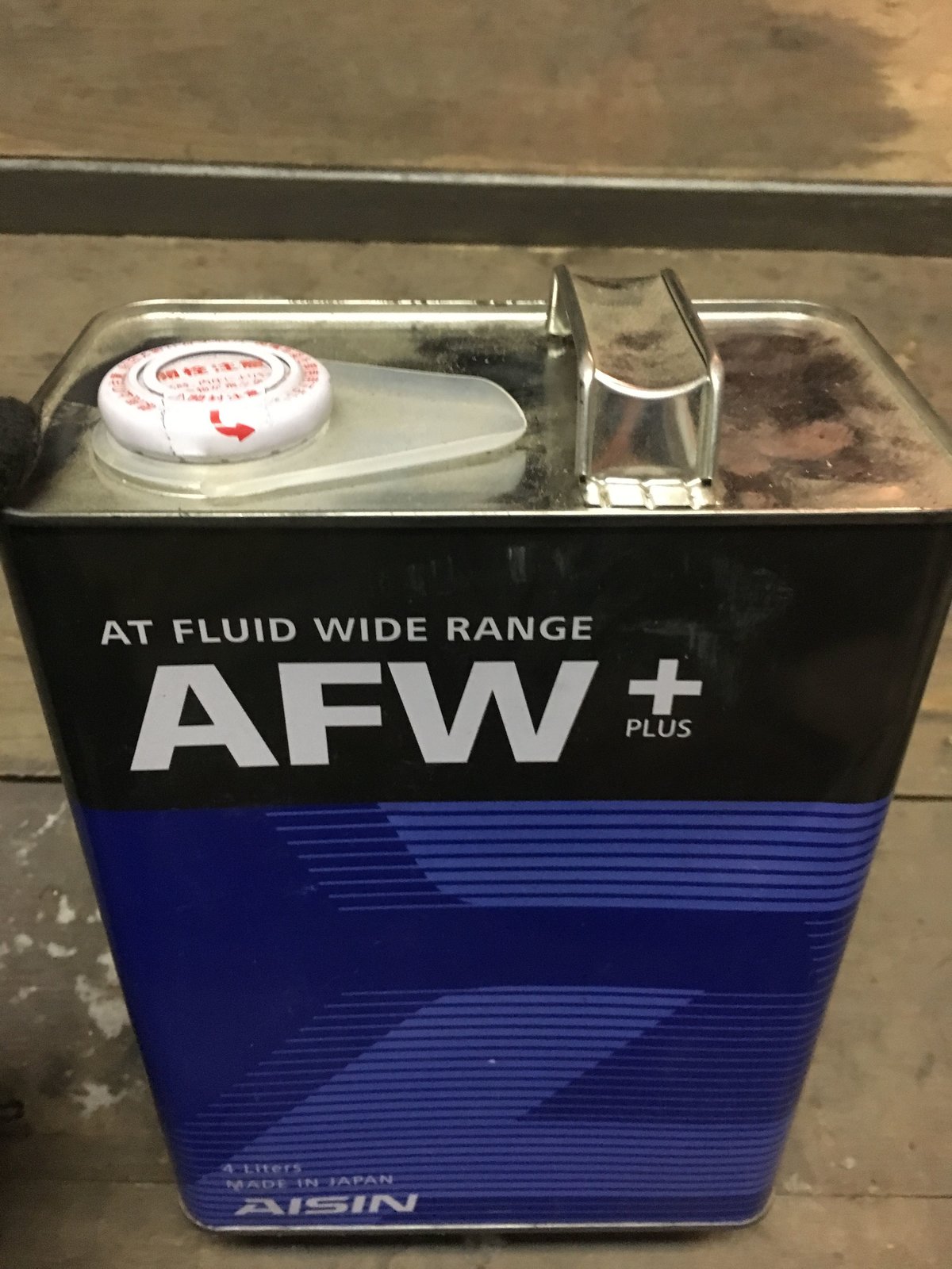 Atf aw. Nippon AW-1 ATF. ATF wide range AFW+. AISIN ATF 1 литровая. АКПП 0c8 ATF wide range AFW+.